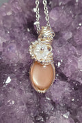Peach moonstone with flower necklace